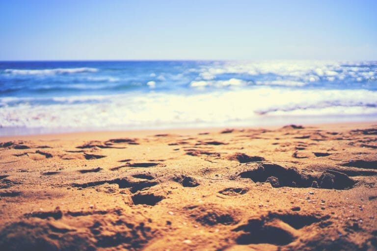 Sandy beach and blue water